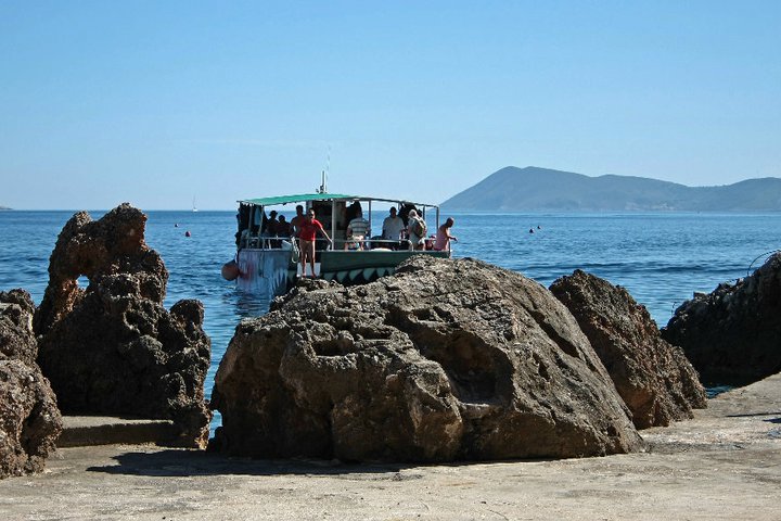 Dive boat and limestone rocks near Komiža