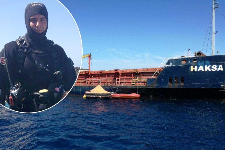Andi Marovic in dive equipment beside the cargo vessel Haksa
